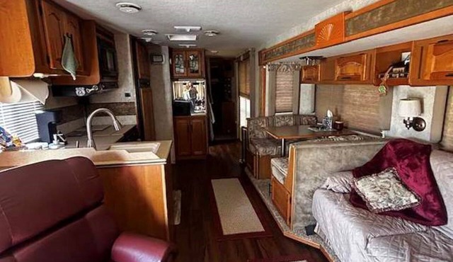 Beautiful 35' RV escape with scenic views, BBQ, fireplace, pet friendly