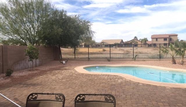 Beautiful 4 Bdrm home with a private pool and golf course views