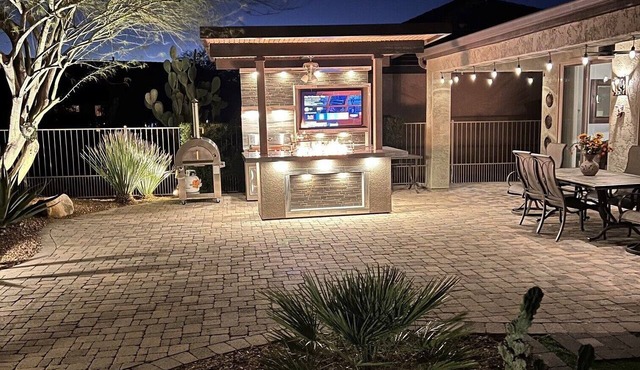 Beautiful home with amazing outdoor kitchen area in 55+ golf community