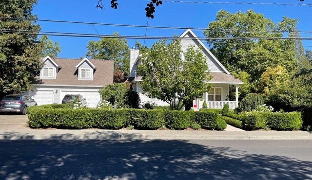 Close to town, 2-car garage, landscaped rear patio with spa, outdoor kitchen.