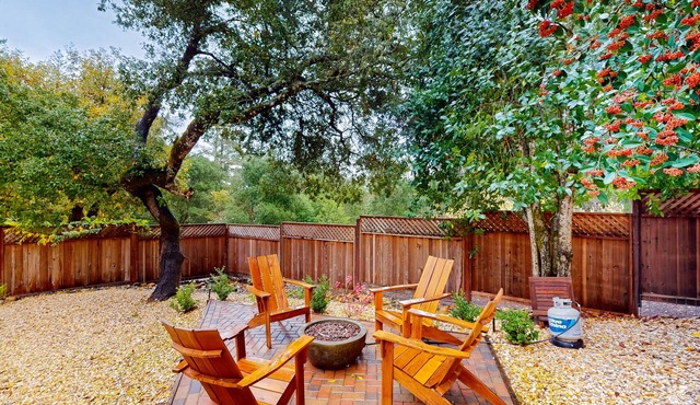 Cozy home in quiet neighborhood with private hot tub, fire pit, & spacious deck