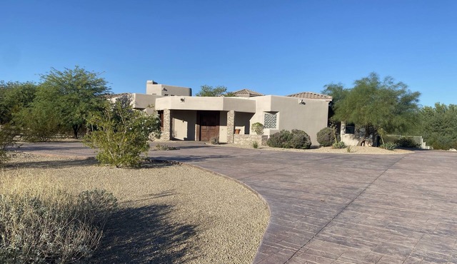 Custom home which boasts spectacular views of the Estrella Mountains