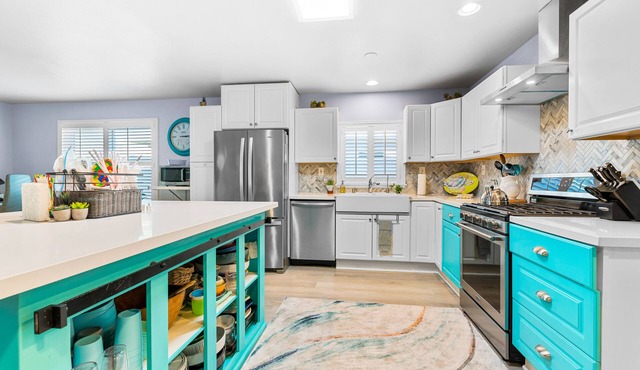 Dog-friendly home with outdoor oasis, hot tub, AC, & W/D - close to the ocean