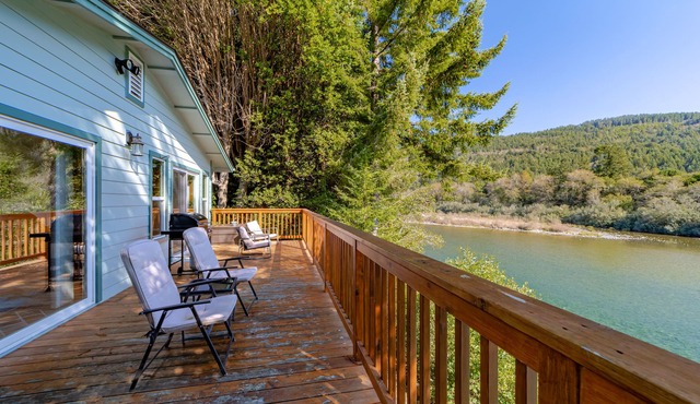 Dog-friendly, riverfront home with deck, fireplace, kayaks & water access