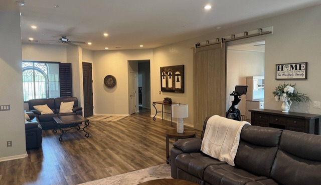 Elegant Three-Bedroom Residence with Two Offices, Pool, and Community Amenities