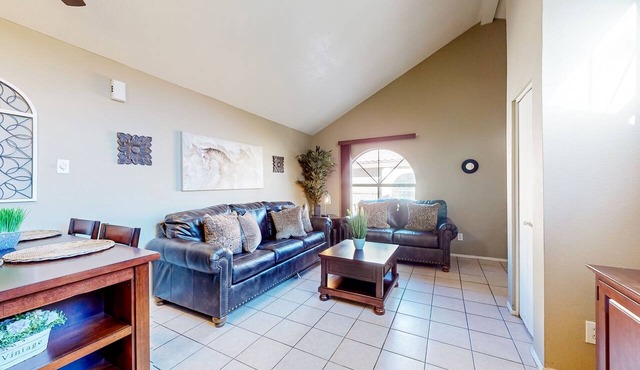 Gated-entry condo with central location, central AC, & private W/D