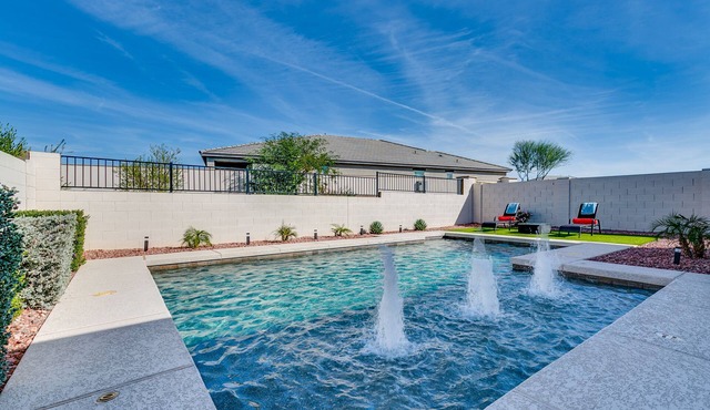 House with outdoor heated pool and recreation area within walking distance