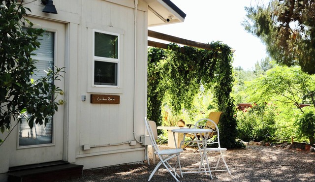 Near Local Wineries amidst 1.3 acres of evolving gardens, its a perfect setting to get away. Pets Welcome.