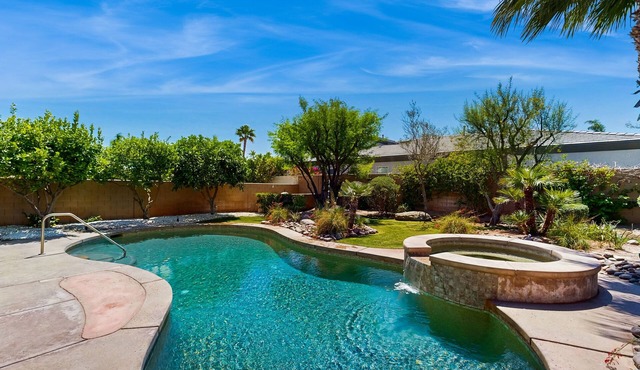 Oasis-style, dog-friendly home w/a furnished patio, yard, private pool, & spa