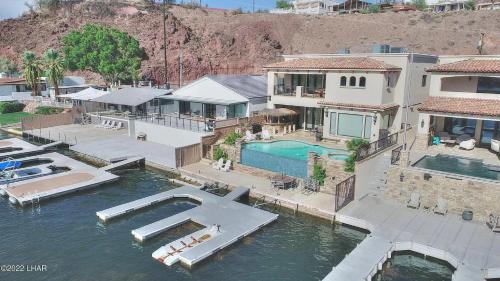 Splash Landing | Riverfront Estate with Infinity Pool, Guest House & Private Docks