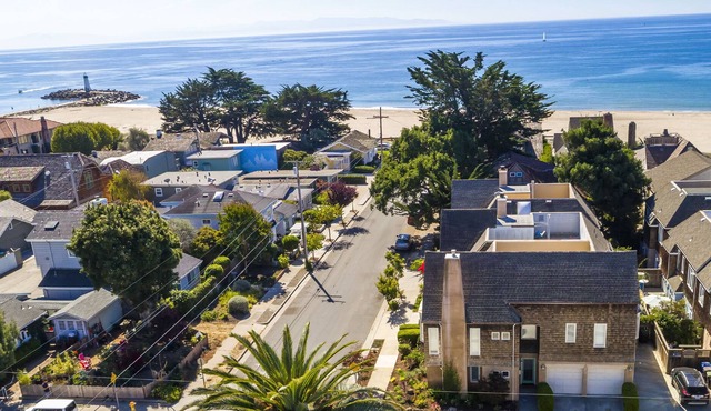 This is the dream vacation house you’ve been searching for just one half block from Seabright Beach!