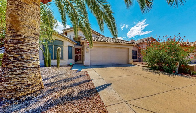 Updated home with private pool, enclosed yard, covered patio, grill, & W/D
