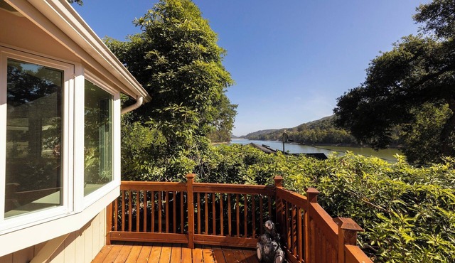 Wake Up to Water Views in This Peaceful 2BR Escape 8 minutes from downtown