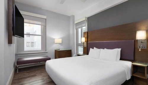One-Bedroom King Suite with Roll-In Shower, Sofa Bed and Work Desk - Mobility Access/Non-Smoking