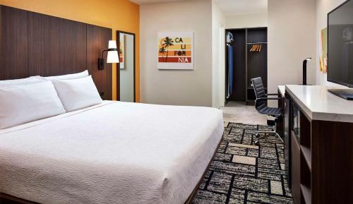 King Suite with Roll-In Shower, Sofa Bed, Living Room and Wet Bar - Disability/Non-Smoking
