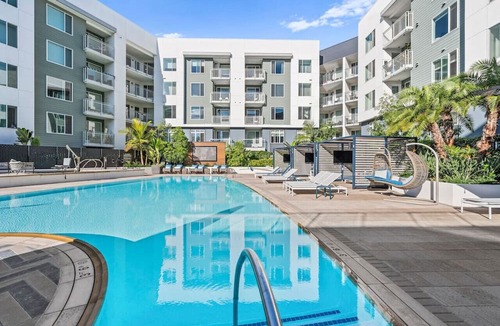 Kearny Mesa Apartment | Deluxe Penthouse Paradise: Heated Pool, Gym, Games. Parking