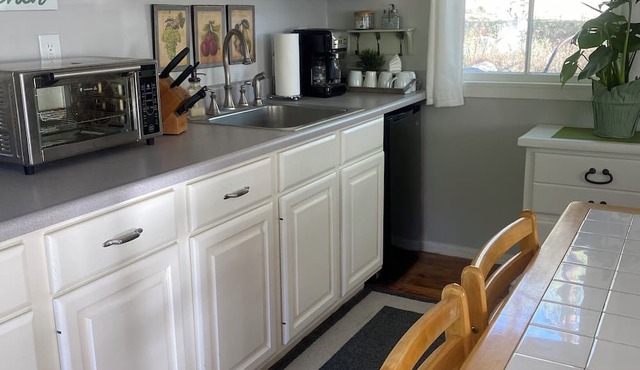 Enchanted 2 bedroom cottage in the tranquil Prescott forest with WiFi, AC, more.